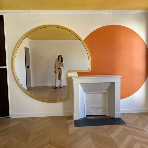 Miroir-rond-et-son-cadre-en-bois-dore