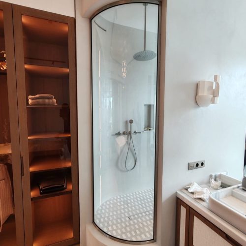 Paroi de douche fixe verre bombé - Serrurerie Inox Brossé